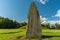 Close up of a large rune stone in a summer field in Sweden