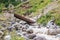 Close-up of a large turbulent flow of water in the river.