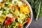 Close up of large white porcelain bowl of pasta with a creamy kale sauce