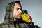 Close-up latin man drinking yellow effervescent vitamin C drug for immunity