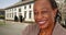 Close-up of a laughing elderly African American woman at a University