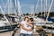 Close up of laughing young couple stand onthe sea harbor