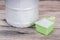 Close-up of laundry detergent powder on wooden surface