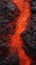 Close-up of a lava flow of volcano texture background. Magma textured molten rock surface banner for wallpaper