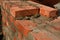 Close up on laying bricks. Building brick wall