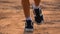 Close up leg of boy running on ground on light of sunset, kids jogging on rural countryside for good heath