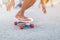 Close Up leg on surf skate or skateboard on a skate park extreme sports. Concept family activity lifestyle of the new generation