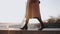 Close-up legs of beautiful happy woman in elegant coat walking near romantic Eiffel tower sky panorama paris slow motion