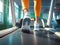 close up legs of human wear orange pants running on treadmill at fitness