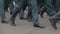 Close-up of the legs of the military, who march on the parade