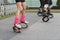 Close up of legs of people in kangoo jumping shoes. Training in the outside