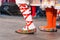 Close up of legs of young Romanian dancers perform a folk dance in traditional folkloric costume. Folklore of Romania