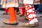 Close up of legs of young Romanian dancers perform a folk dance in traditional folkloric costume. Folklore of Romania