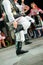 Close up of legs of young Romanian male dancer in traditional folkloric costume. Folklore of Romania