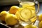 close-up of lemon slices floating in a glass pitcher