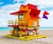 Close up of a lifeguard tower in Miami Beach under a cloudy sky