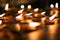 Close up Light bulbs or Lighted candle to worship the Buddha in night time