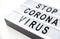 Close up of lightbox with stop corona virus words