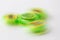 Close up of lime green spinning fidget spinner