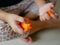 Close up of little baby`s hands playing playdough