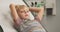 Close up of little boy waiting for doctor on exam table in pediatric office