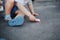 Close up of little girl drawing with chalks on the sidewalk