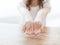 Close up of little girl showing empty cupped hands