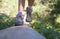 Close up of little girls feet walking and balancing on a fallen tree trunk