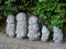 Close up of the little Nagomi Jizo statues located outside the Arashiyama Bamboo Forest, Kyoto