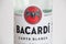 Close-up for logo of Bacardi at Bacardi Carta Blanca Rum bottle.