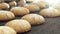 Close up of lots of baked breads. Slowly