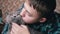 Close up, Loving Boy Hugging, Kisses a Gray British Fluffy Cat in Room