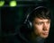 Close Up Low Key Lighting Shot Of Young Man Wearing Wireless Headphones 