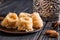 Close up, macro. Eastern sweets. Turkish Baklava bird`s nest. Copy space