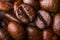 Close Up macro a group roasted brown coffee bean grains background.shallow focus effect.