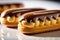 Close up macro image of Eclairs garnished with chocolate.