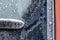 Close-up, macro image of a heavily frosted windshield of an automobile.