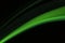 A close up macro photo of a diagonal wisp of green smoke on a black background that makes an abstract artistic retro background