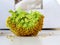 CLose-up macro shot of broccoli on kitchen table