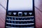 Close-up macro shot of vintage Blackberry RIM Research in Motion smartphone
