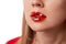 Close up macro womans plump lips with red gloss and silver stars. Beauty fashion portrait personal make up
