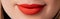 Close up macro womans smiling lips with red matte lipstick. Beauty fashion portrait personal care and make up