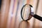 Close up Magnifying Glass Leaning on Wooden Table