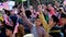 Close up Malays kids raise flag during national day