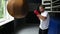 Close up Male boxer boxing in punching bag, slow motion
