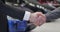 Close-up of male Caucasian hand giving car keys to customer and shaking his hand. Dealer and client making agreement on