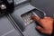 Close Up of Male Hand entering Personal Identification Number at an ATM Machine To Withdraw Cash. Close Up. ATM Transaction. Soft