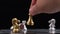 Close up of male hand moving gold king chess for defeating opponent, Game of Chess. Leader and Teamwork Concept for Success. Busin