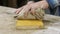 Close-up. A Male Hand Rubs A wooden board With Burlap After Applying Wood Impregnation To It. Homemade Pastewax, Ganozis. Water-