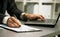 Close up of male hands doing paperwork